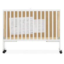 Load image into Gallery viewer, Dream on Me Quinn Full - Size Folding Crib. Removable Wheels. Modern Nursey. Adjustable Mattress Support. Patent Folding System in White