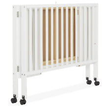 Load image into Gallery viewer, Dream on Me Quinn Full - Size Folding Crib. Removable Wheels. Modern Nursey. Adjustable Mattress Support. Patent Folding System in White